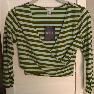 mint green crop top with brown strips